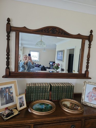 Old charm over mantle mirror - mantle,